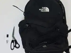 How to Reattach a North Face Backpack Bungee Cord