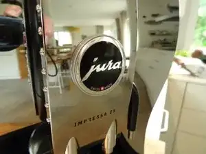 Koffie uitloop reinigen.