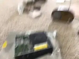 Remove the WiFi Module screw.