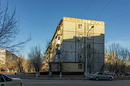 historic=epigraph + location=wall (or location=parapet) + epigraph=slogan + inscription=СЛАВА ТРУДУ