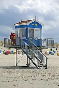 A lifeguard tower emergency=lifeguard lifeguard=tower
