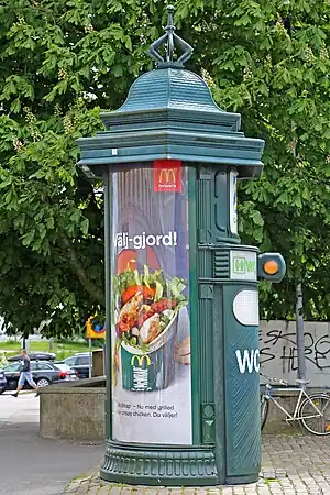 A toilette hidden in an advertising column