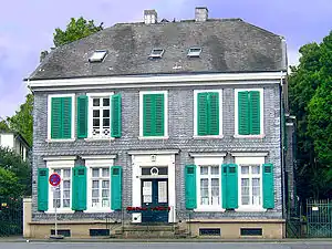 Facade and roof are made of slate