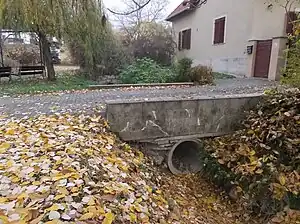 Small culvert in dry/intermittently filled ditch