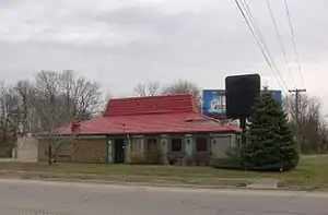 From aerial imagery, this building appears to have all the distinctive features of a Pizza Hut restaurant, but it is actually something else.