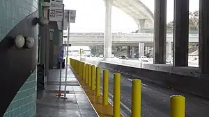 Bus stop on highway with bollards