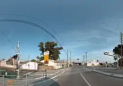 Level crossing in Los Angeles crossing:whistle=optional