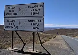A sign in Afrikaans, English, Tswana and Xhosa (bottom right)