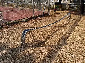 A rope_traverse consisting of three smaller, tied ropes. Since there is no railing/tether/rope to hold on to, handrail=no can be added.