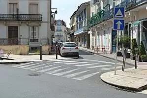 Not a continuous footway, but a raised zebra crossing, because the road surface continues. Should be tagged with crossing:markings=zebra, crossing_ref=zebra and traffic_calming=table.
