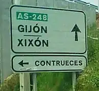 Bilingual sign in Spanish and Asturian 529391484 529391484