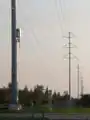 A SMUD dual-circuit 230 kV line on tubular steel poles.
