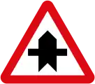 Warning that the road has priority at the upcoming intersection: highway=priority